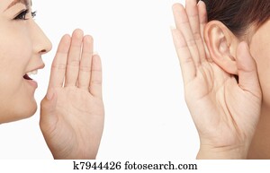 women talking and listening to gossip