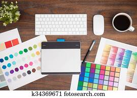 Office desk of a graphic designer Office desk of a graphic designer