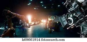 Robotics automatic arms machine of making movie and TV commercial in studio. Camera of movie. Innovation and technology of movie industry with monitoring system software. Film crew team in set. Robotics automatic arms machine of making movie and TV commercial in studio. Camera of movie. Innovation and technology of movie industry with monitoring system software. Film crew team in set.