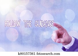 Writing note showing Follow The Guidance. Business photo showcasing controlling a course of projectile by builtin mechanism.