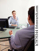 Businesswoman listening to client