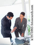 Businesswoman providing pen to sign contract