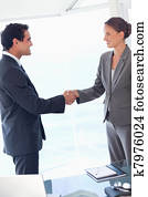 Side view of business partner agreeing on a deal