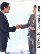 Side view of business people welcoming each other