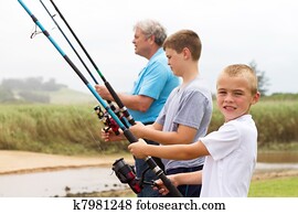 two young grandsons fishing with grandpa
