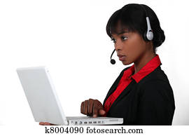 An African American businesswoman at work.