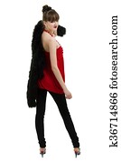 Woman trying jacket with fur.