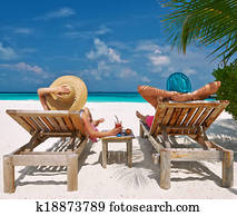 Couple on a beach at Maldives Couple on a beach at Maldives