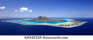 Full View of Bora Bora Lagoon, French Polynesia from above on a near cloudless day. Prime honeymoon destination 