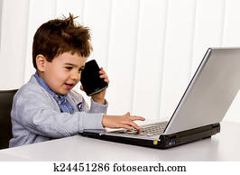 little boy on a laptop little boy on a laptop