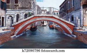 Old stone bridge over water canal in Venice, Italy Old stone bridge over water canal in Venice, Italy