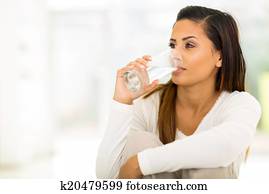 young woman drinking water young woman drinking water
