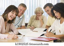 Adult students studying together Adult students studying together