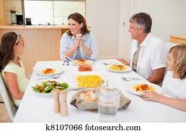 Family sitting at the dinner table