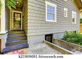 Backyard small porch. House exterior design