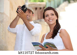 Tourists photographing monuments