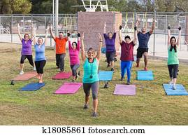 Diverse Group Exercising Outdoors