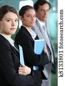 Young businesswoman with colleagues