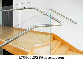 Modern interior with wooden stairs Modern interior with wooden stairs