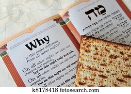 Traditional Jewish Matzo sheet on a Passover Seder table. Passover  is a predominantly Jewish holy day and festival. It commemorates the story of the Exodus, in which the ancient Israelites were freed