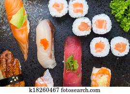 japanese cuisine. sushi set on the background