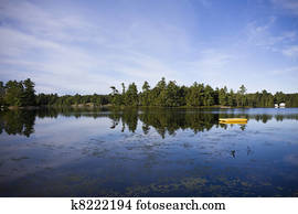 Calm lake water shot in Muskoka, Ontario Cottage Country