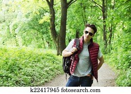  man  walks in the forest