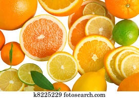 Vitamin C Overload, Stacks of sliced fruit isolated on white Vitamin C Overload, Stacks of sliced fruit isolated on white