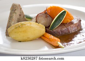 Close-up of steak meal in gourmet restaurant