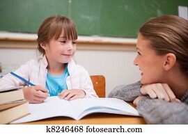 A teacher and a schoolgirl talking A teacher and a schoolgirl talking