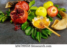 Pomegranate, apples and honey for Rosh Hashanah with horn. Pomegranate, apples and honey for Rosh Hashanah with horn.