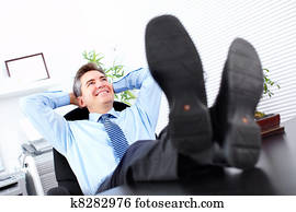Relaxing handsome businessman.