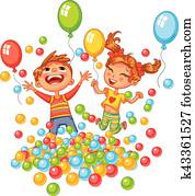 Happy boy and girl playing with colorful balls at playground