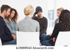Serious rehab group at a therapy Serious rehab group at a therapy