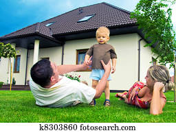 Happy family and house