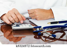 doctor with a calculator.