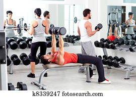 group of people in sport fitness gym weight training group of people in sport fitness gym weight training