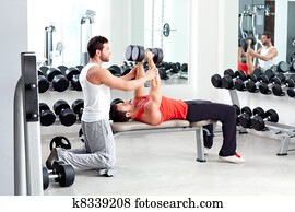 gym personal trainer man with weight training gym personal trainer man with weight training
