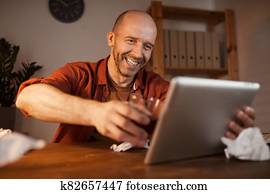 Man has online conversation Man has online conversation