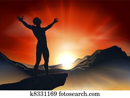 Man on mountaintop with arms out Man on mountaintop with arms out