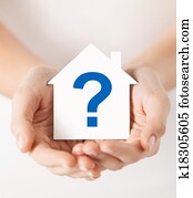 hands holding house with question mark hands holding house with question mark