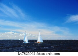 Yachts in sailing race Yachts in sailing race