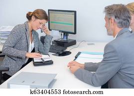 loan officer having a phone conversation