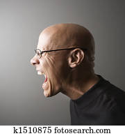 Profile of man screaming.