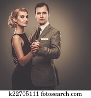 Well-dressed retro couple 