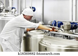worker on a milk factory worker on a milk factory
