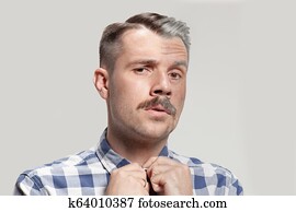 Collage of two portraits of the same old man and young man. Face lifting, aging and skincare concept. Conparison