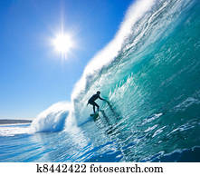 Surfer On Blue Ocean Wave
