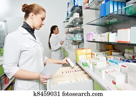Pharmacy chemist women in drugstore Pharmacy chemist women in drugstore