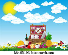 basket for a picnic with tableware and foods on nature basket for a picnic with tableware and foods on nature